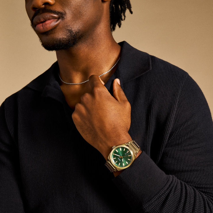 Fossil Everett Three-Hand Date Gold-Tone